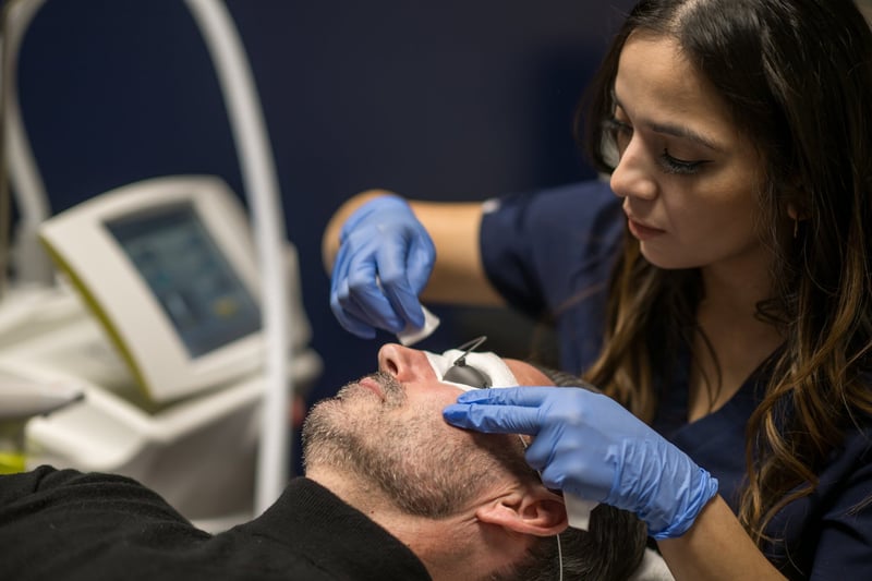 preparing a male client for IPL treatment