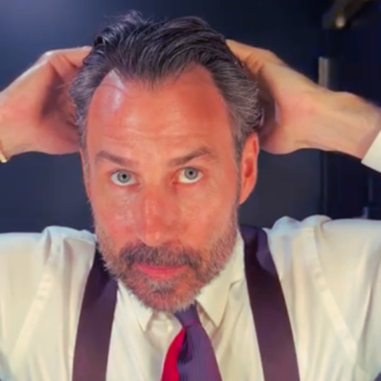 Man applying GetHairMD personalized prescription hair loss topical